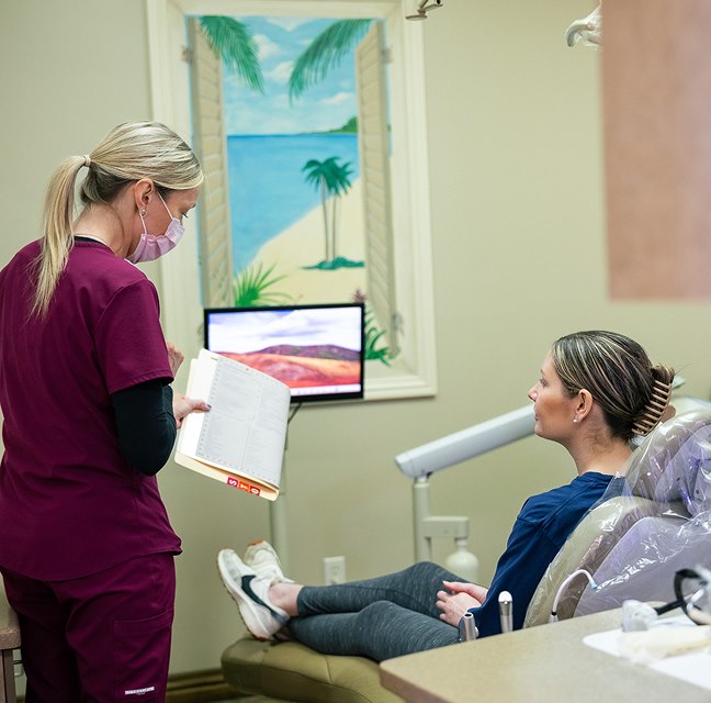 Dental consultation with patient in chair