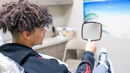 Patient smiling during dental visit